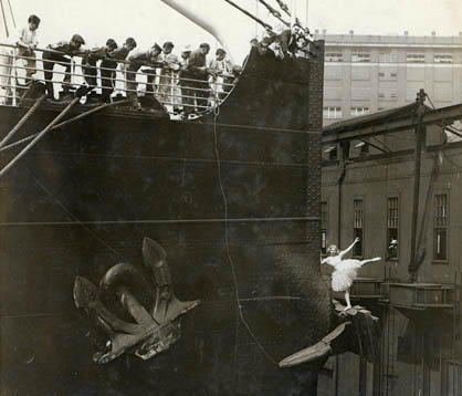 Detail of Dorothy Rae dancing on a ship's anchor.