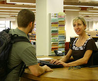 librarian helping a student