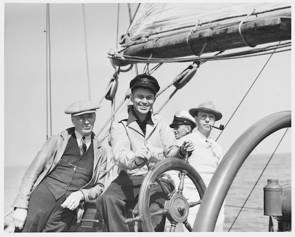 Lions Club - Men on boat high resolution image