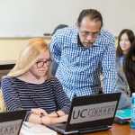 Librarian helping student