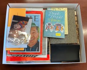 A box of materials from the Dalip Singh Saund papers waiting to be inventoried.