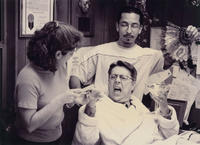 Photograph of Dan Guerrero hamming it up with the make-up team