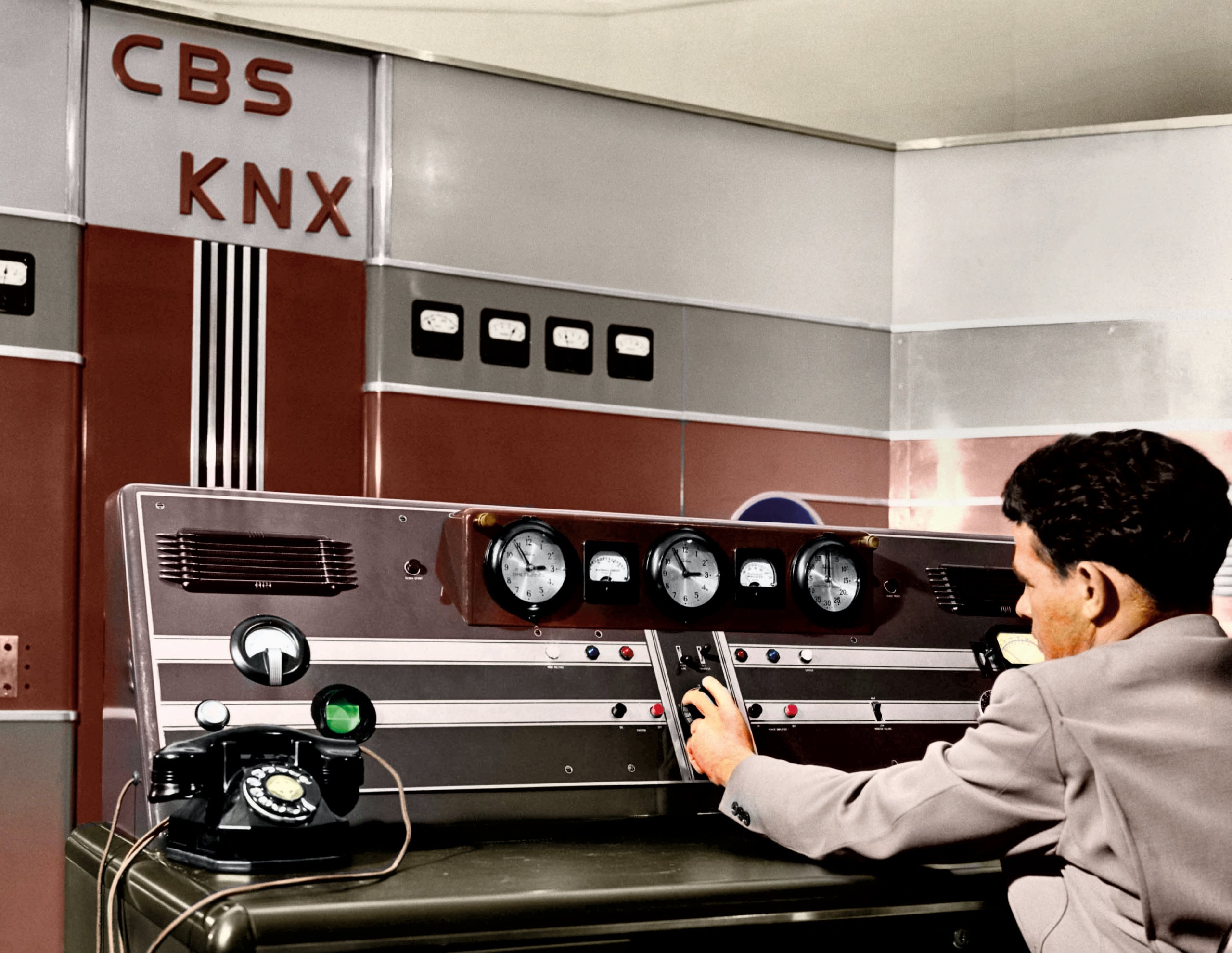 Unidentified man in a CBS-KNX recording booth.