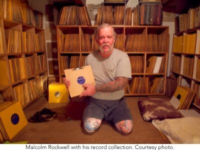 Malcolm Rockwell with his record collection.