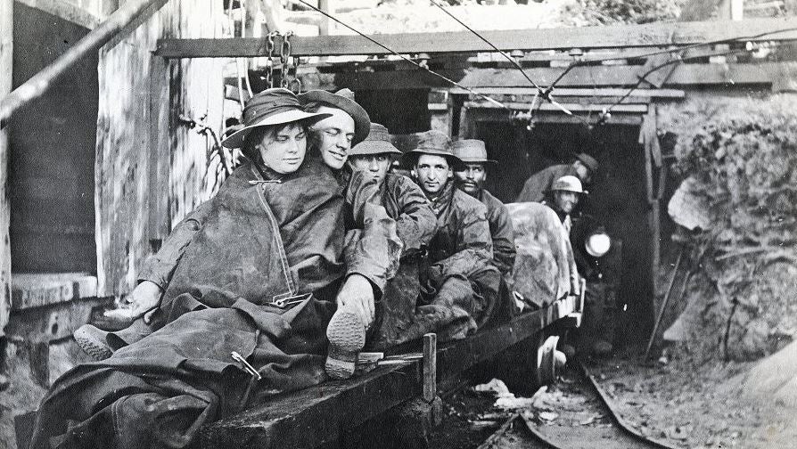 Librarian and workmen enter the Santa Barbara Waterworks Tunnel to the construction camp at Gibraltar Dam