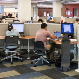Patrons using Library public computers. 