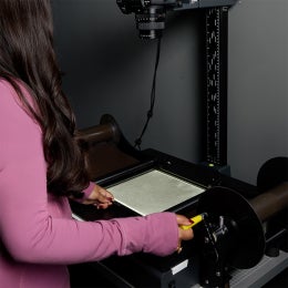 Digital Library Development Department staff digitizing aerial photographs 