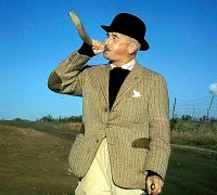 William Faulkner with hunting horn, at Farmington Hunt Club, 1960.