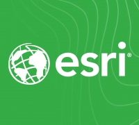 Esri logo on top of green topographic map.