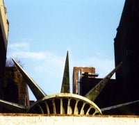 rusted statue of liberty crown above el teddys restaurant in tribeca