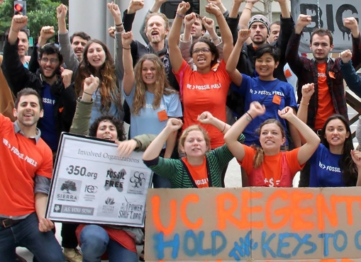 Fossil Free UC student activists celebrating having their voices heard at a Board of Regents meeting
